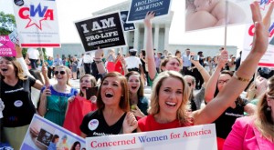 Pro-life supporters with Concerned Women for America celebrate the Hobby Lobby victory at the Supreme Court on June 30. (Reuters/Jonathan Ernst)