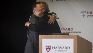 ZORIGOO TUGSBAYAR (photo credit) Gerald L. Chan, left, and University President Drew G. Faust embrace upon receiving the $350 million gift.