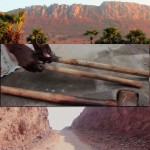 man uses hammer and chisel to remove mountain